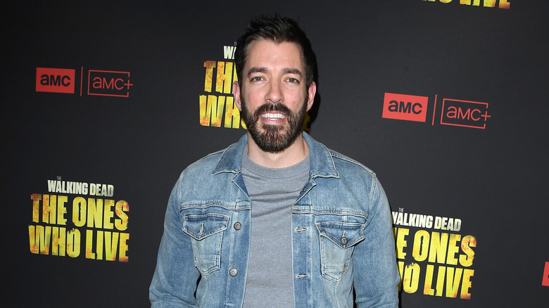 Drew Scott wearing a denim jacket