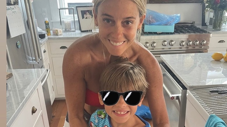 Nicole Curtis posing with her son Harper