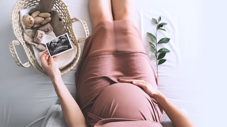 pregnant woman looking at ultrasound