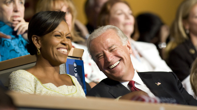 Michelle Obama and Joe Biden laughing