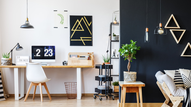 office space with black accent wall