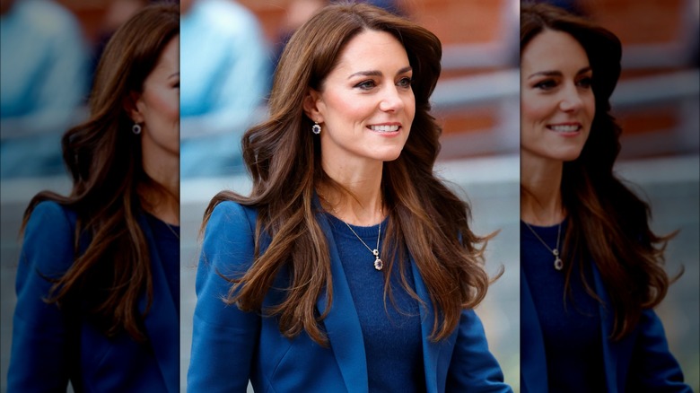 Princess Catherine in blue, looking off