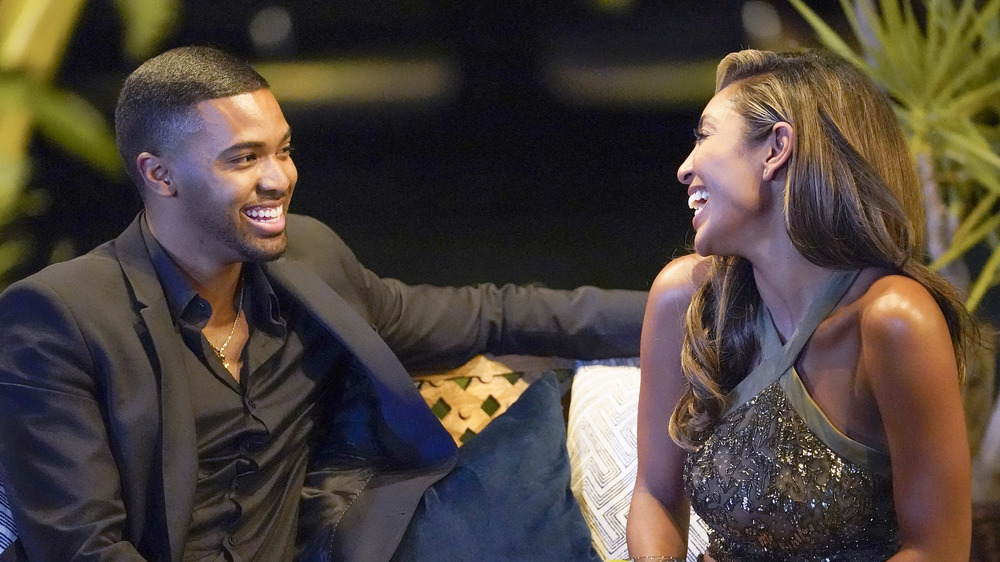 Ivan Hall and Tayshia Adams laughing