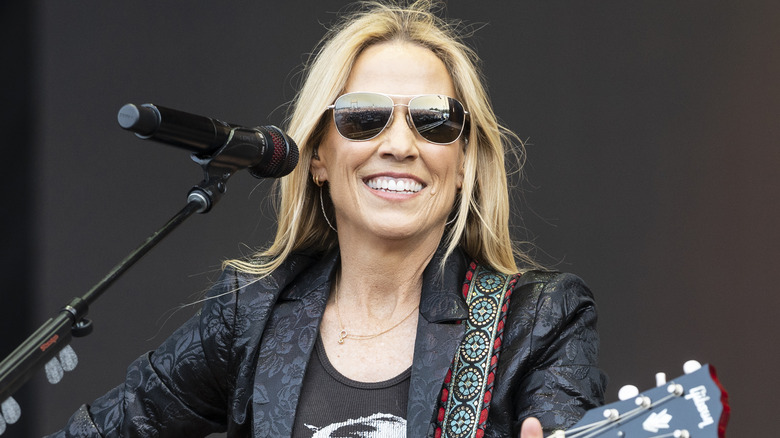 Sheryl Crow performing onstage