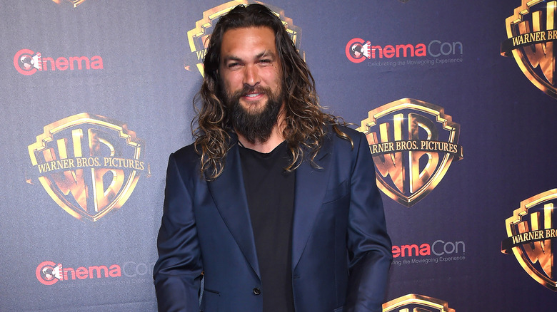 Jason Momoa posing on red carpet