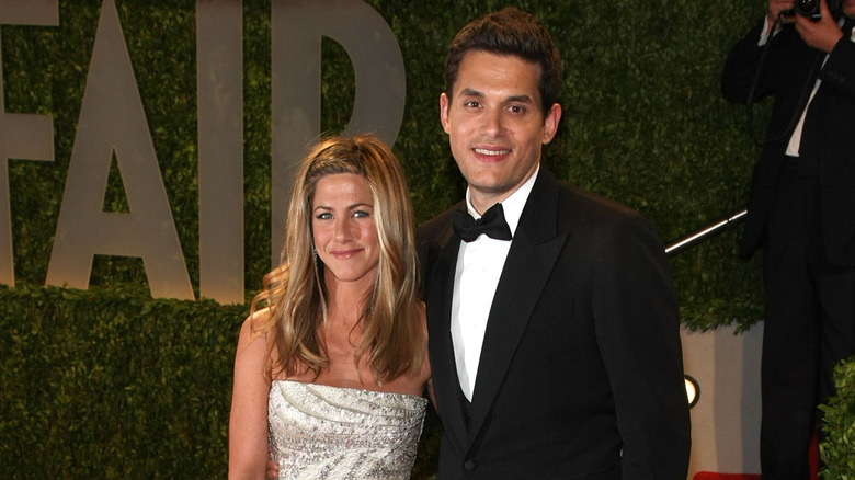 Actress Jennifer Aniston and John Mayer arrive at the 2009 Vanity Fair Oscar Party