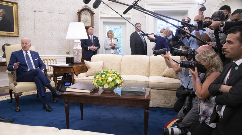 Biden in the Oval Office Taking questions from reporters