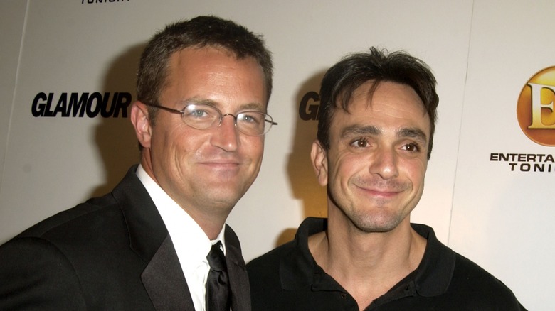 Matthew Perry and Hank Azaria smiling