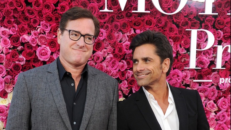 John Stamos and Bob Saget at an event