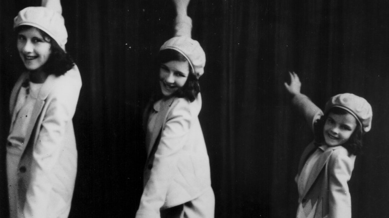 Judy Garland dancing with sisters