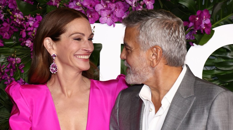 George Clooney and Julia Roberts smiling.