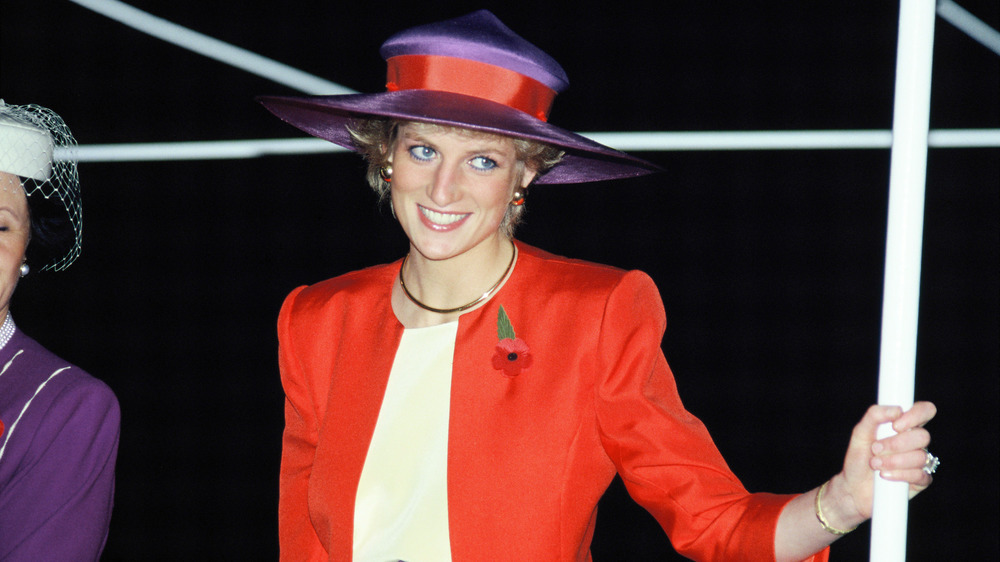 Princess Diana in a purple hat