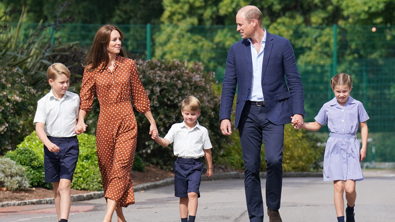 Prince William and Kate Middleton take their children to school. 