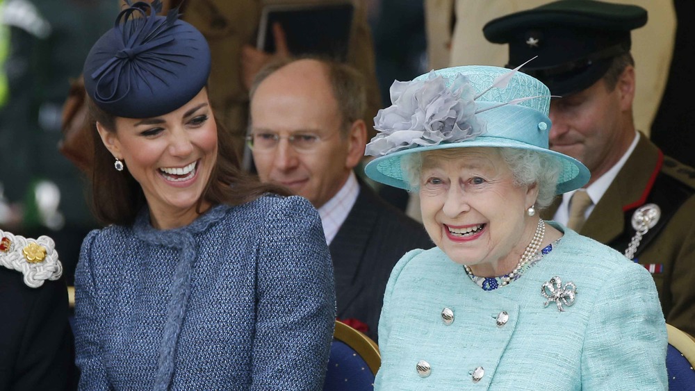 Queen Elizabeth and Kate Middleton laughing
