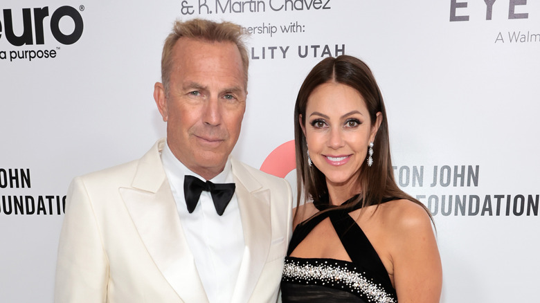 Kevin Costner and his second wife Christine Baumgartner on the red carpet.