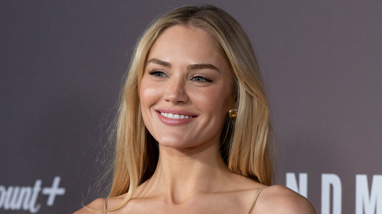 Close-up of Michelle Randolph at "Landman" premiere smiling with hair down