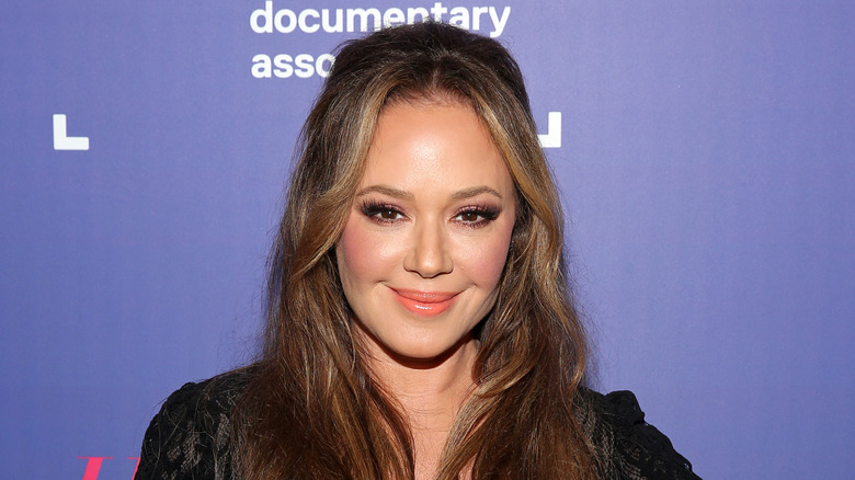 Leah Remini poses on the red carpet