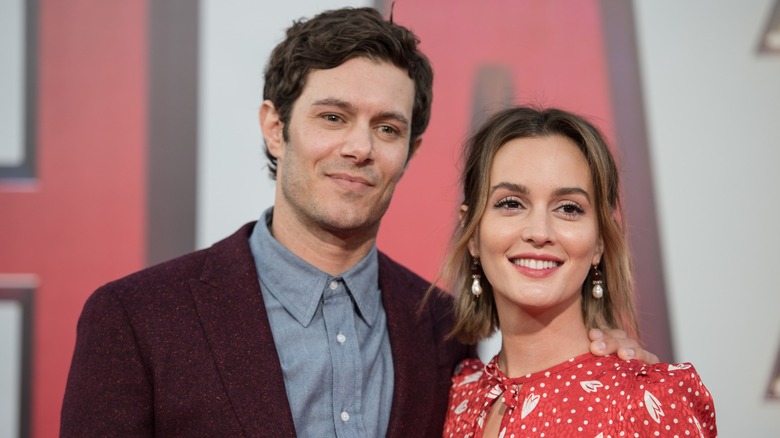 Leighton Meester and Adam Brody smiling