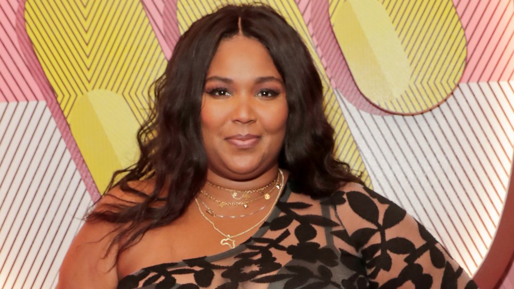 Lizzo on a red carpet earlier this year