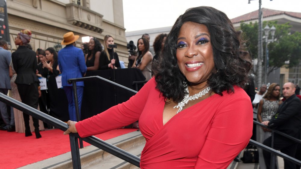 Loretta Devine smiling at a red carpet event