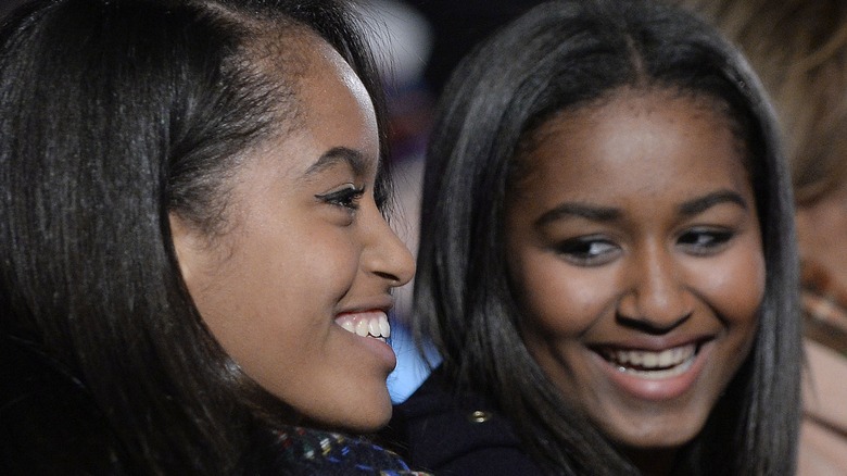 Malia and Sasha Obama smiling