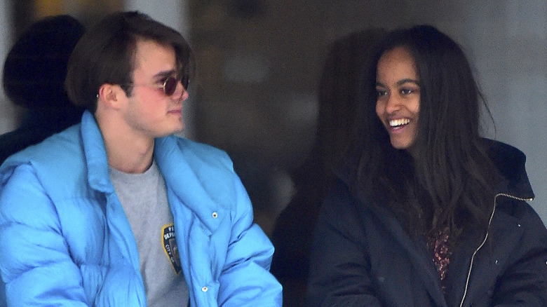 Rory Farquharson and Malia Obama smiling at each other