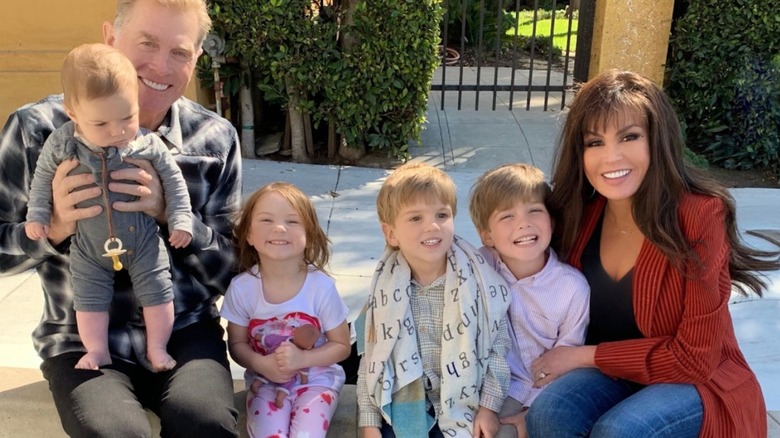 Marie Osmond and Stephen Craig pose with grandchildren