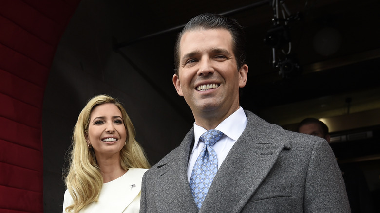 Ivanka Trump and Don Jr. smile for photographers