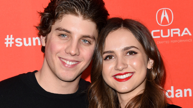 Maude Apatow and Lukas Gage pose together on the red carpet