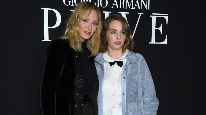 Maya Hawke and Uma Thurman posing on red carpet