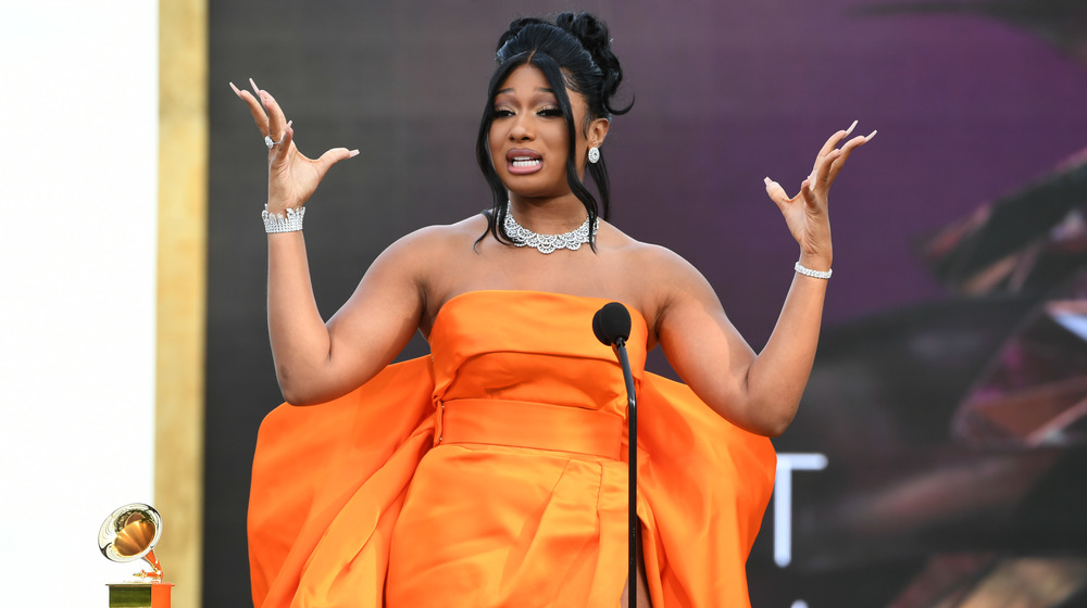 Megan Thee Stallion flaming orange dress