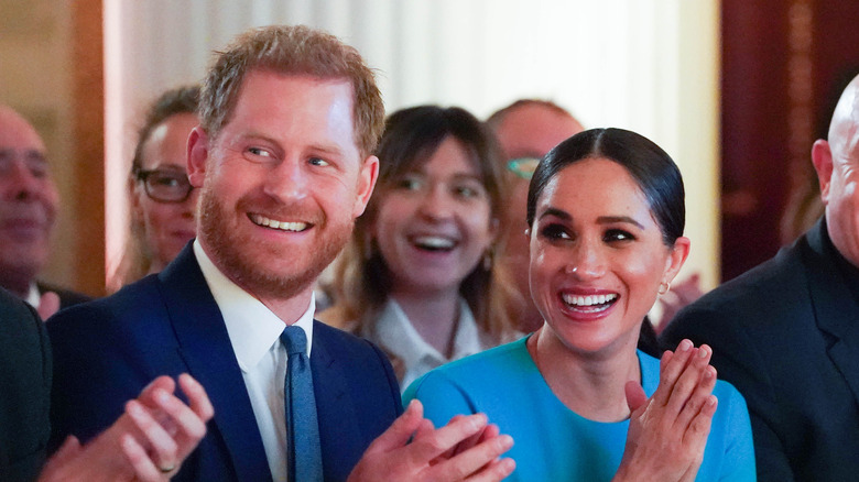 Meghan and Harry smiling 