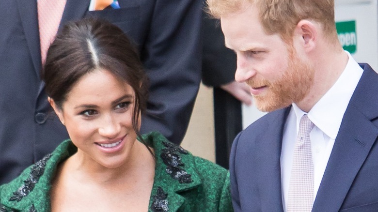 Prince Harry and Meghan Markle walking