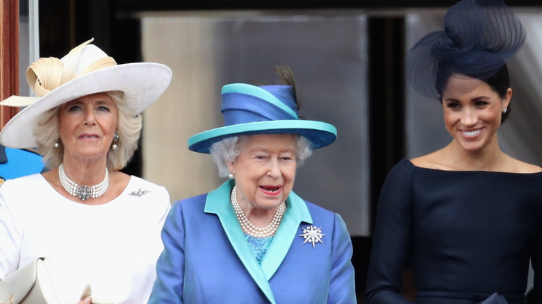 Camilla Parker Bowles, Queen Elizabeth, Meghan Markle RAF 2018