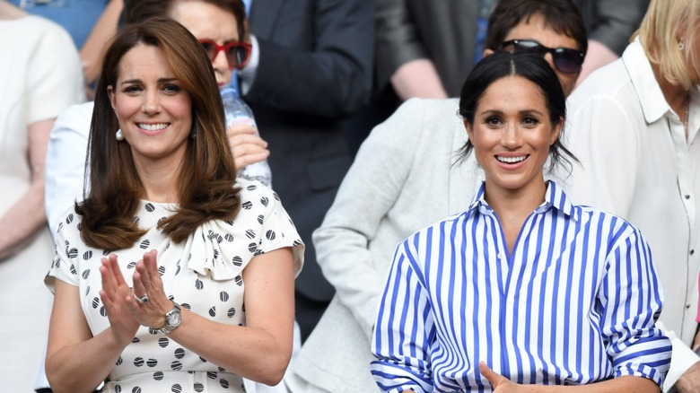 Kate Middleton and Meghan Markle smiling