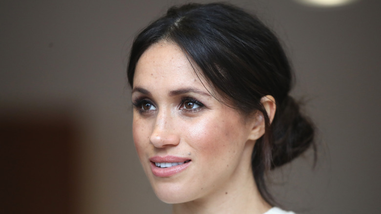 Duchess Meghan Markle poses for a photo. 