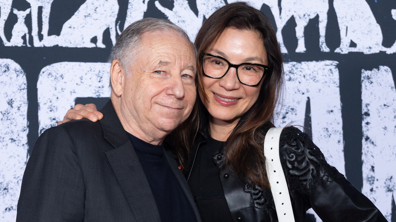 Michelle Yeoh with her arm around Jean Todt