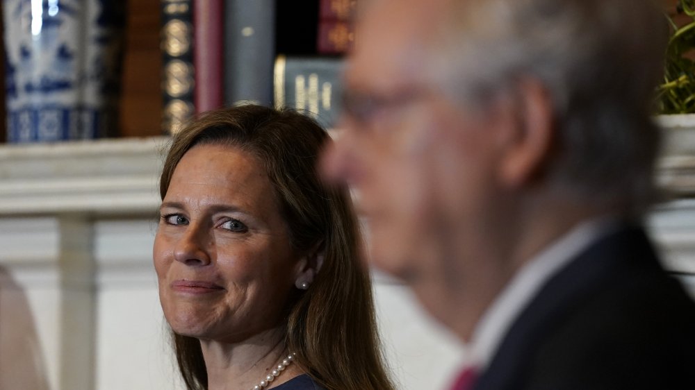 Amy Coney Barrett and Mitch McConnell