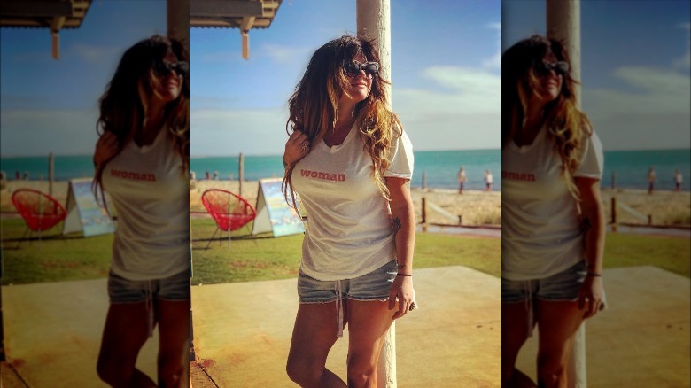 Constance Hall wearing "woman" t-shirt