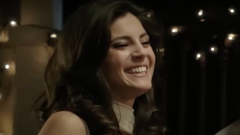 Monica Barbaro laughing in I'm Charlie Walker