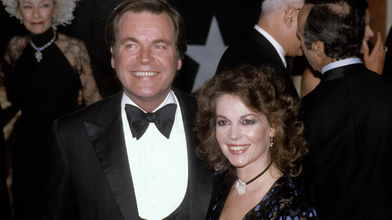 Natalie Wood and Robert Wagner posing at a red carpet