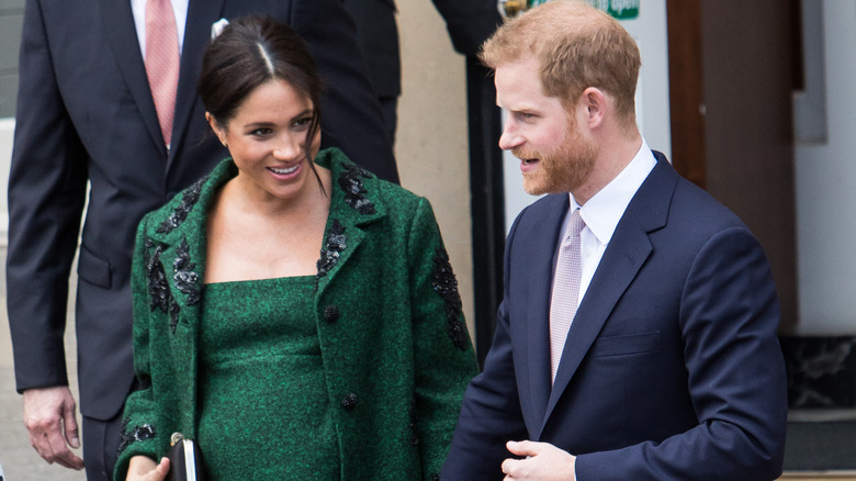 Prince Harry and Meghan Markle pregnant green dress