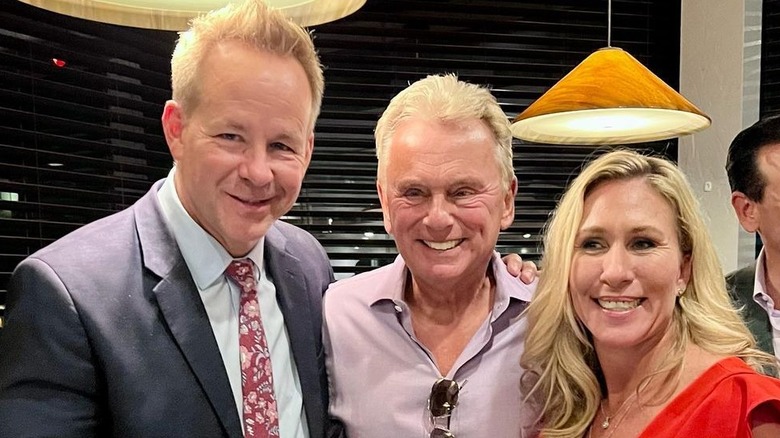 Brian Glenn, Pat Sajak, and Marjorie Taylor Greene smiling