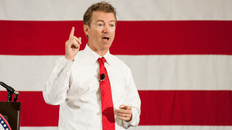 Rand Paul speaks in front of American flag