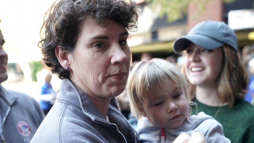 Amy McGrath and her young daughter Eleanor at a rally