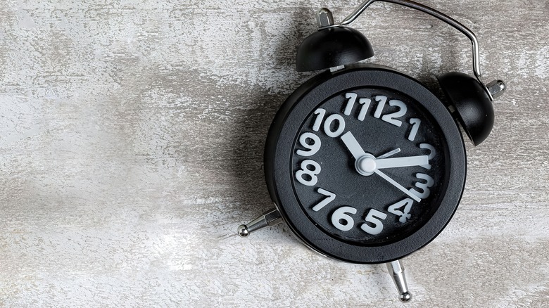 Clock on a concrete floor 