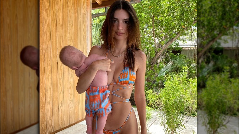 Emily Ratajkowski poses with baby in matching bikinis