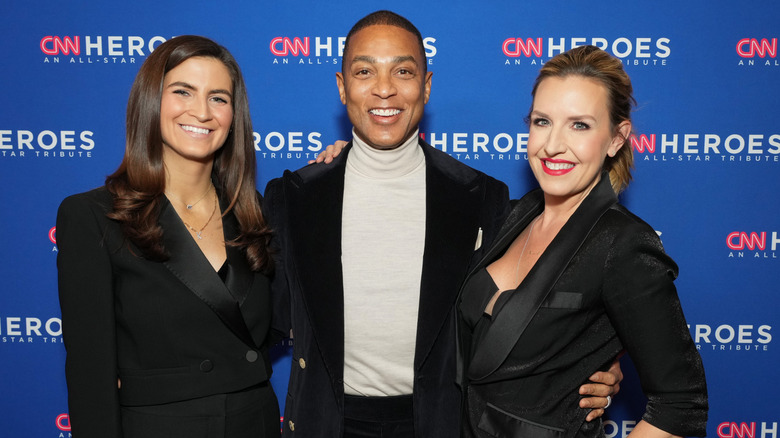 Poppy Harlow smiling with colleagues at CNN Heroes event in 2022