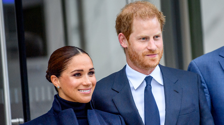 Harry and Meghan smiling