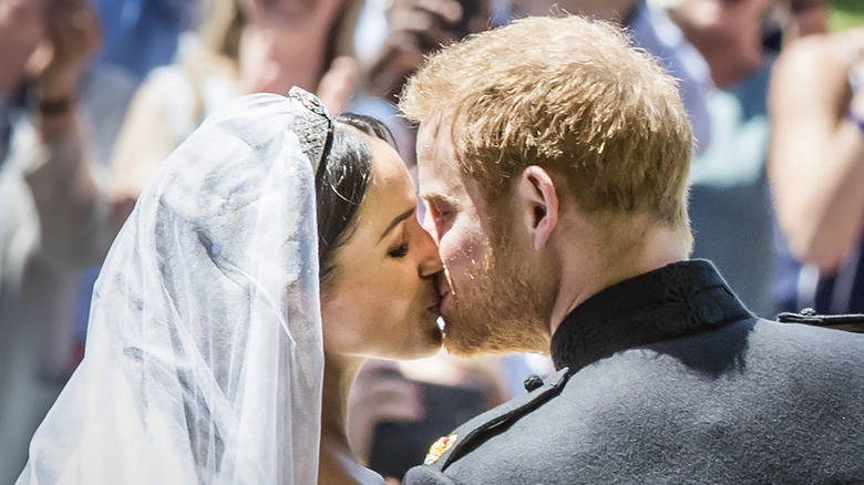 Meghan Markle and Prince Harry kiss on their wedding day